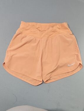 Nike Women's Drifit Peach Running Shorts. Size Medium.